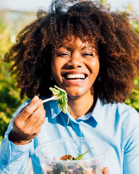 happy woman eating healthy